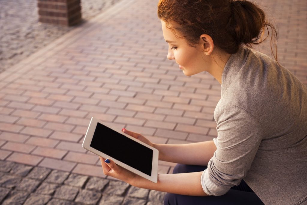 Woman searching the EDH website on her iPad